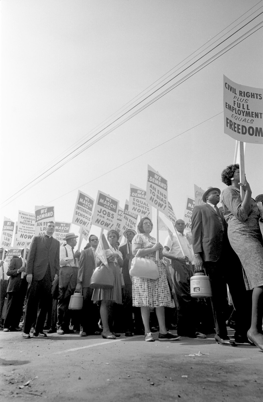 crowd protesting corporations